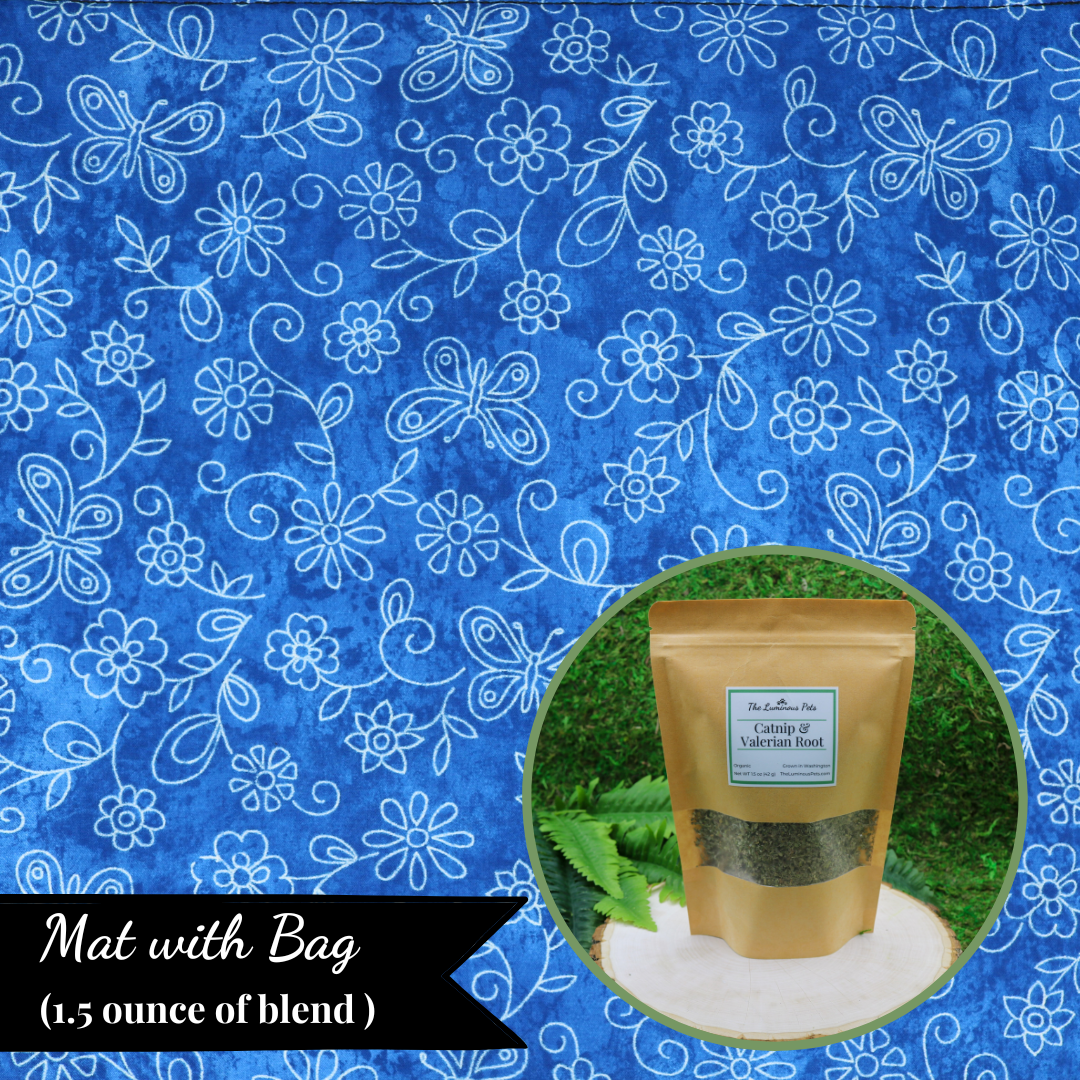 The Luminous Pets Refillable Catnip Mat with Flowers and butterflies on blue | Comes with to refillable pouches of catnip and valerian root