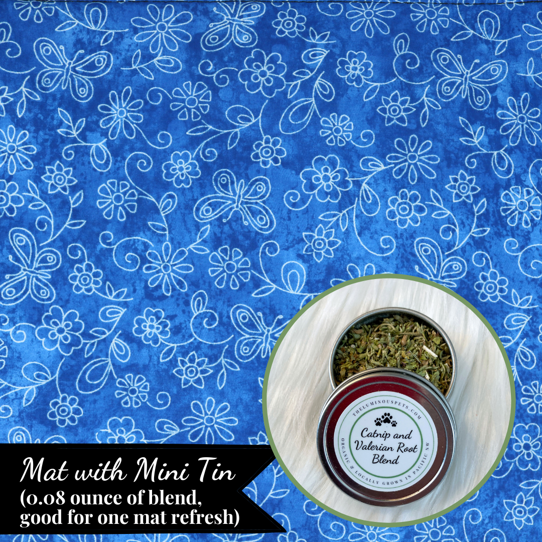The Luminous Pets Refillable Catnip Mat with Flowers and butterflies on blue | Comes with to refillable pouches of catnip and valerian root