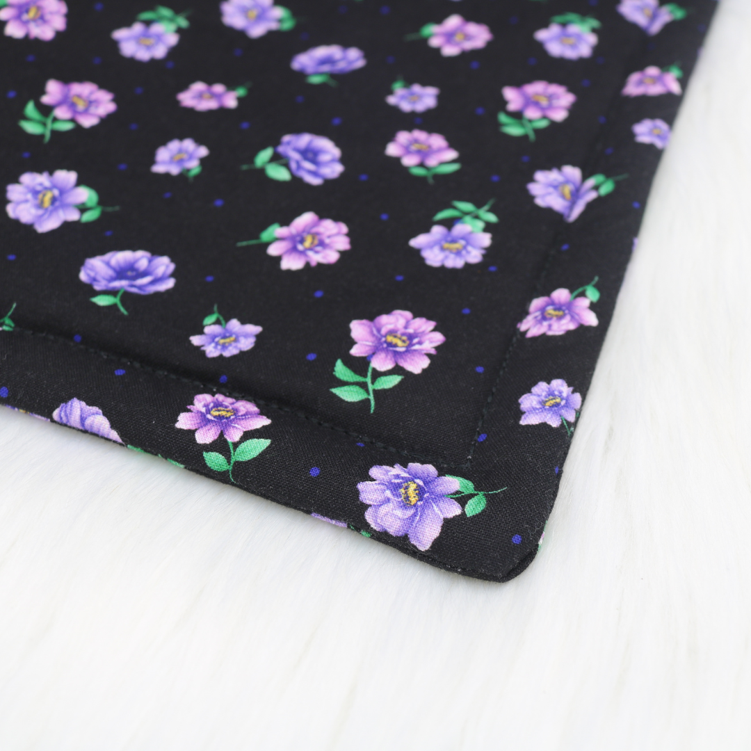 The Luminous Pets Refillable Catnip Mat with purple dahlias