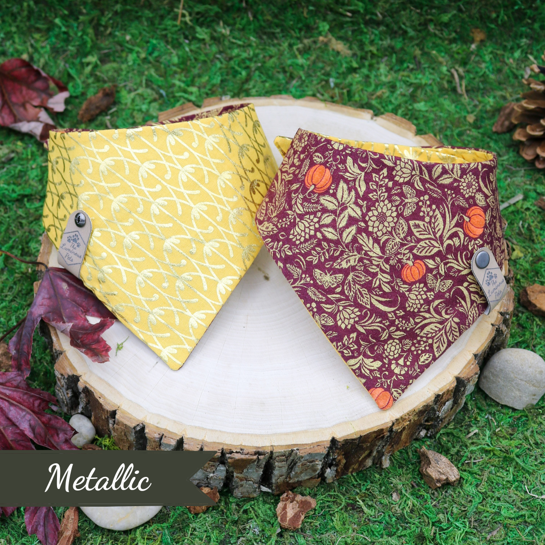 Snap on Autumn Bandana | Pet Accessories | Front Pumpkins and Gold Foil Vines on Maroon | Back Side is Squash Yellow with Gold Foil Lattice | Handmade by The Luminous Pets