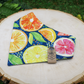 Snap on reveresible bandanas for cats and dogs by Luminous Pets - Summer citrus slices and lemon leaves